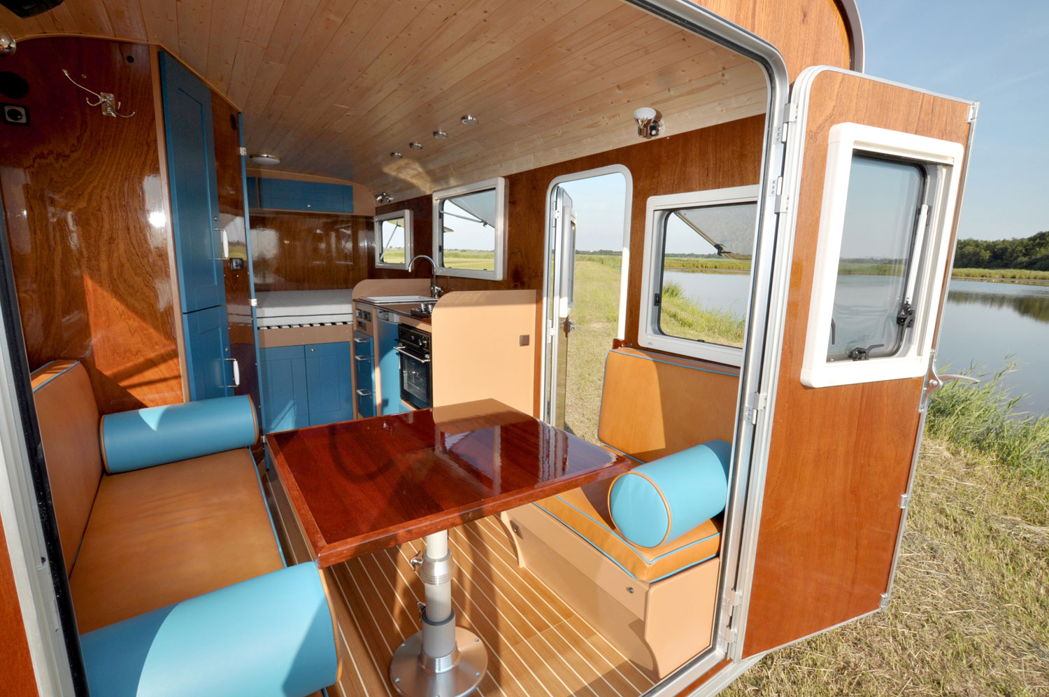 Backdoor view of the Tonke Sprinter camper interior (Fieldsleeper II)